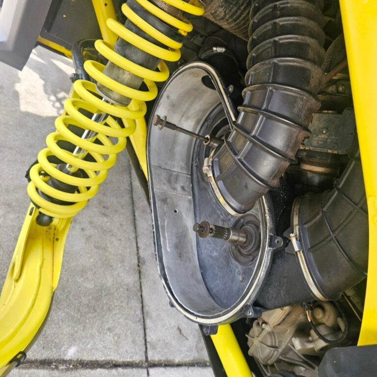 Exhaust and cooling system components removed for inspection during watercraft engine service