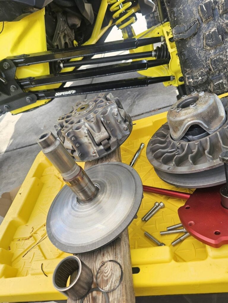 CVT clutch assembly and drive components removed for service on a Powersports vehicle